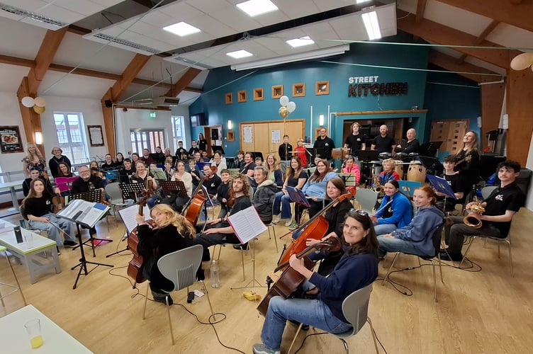 Crediton Youth Orchestra joined by parents and returning past members for its 10th year anniversary concert.