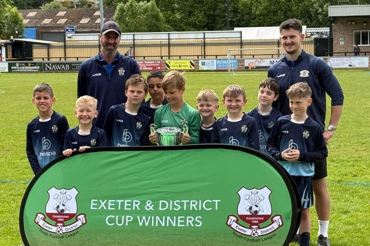 The U9s with the league cup