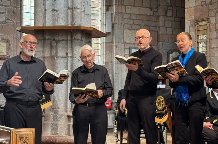 Some of the members of the Ad Hoc singers. AQ 0944