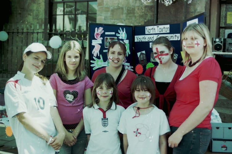 Members of the North Tawton Youth and Community Centre on their stall at the Midsummer Madness event in June 2006. DSC01557