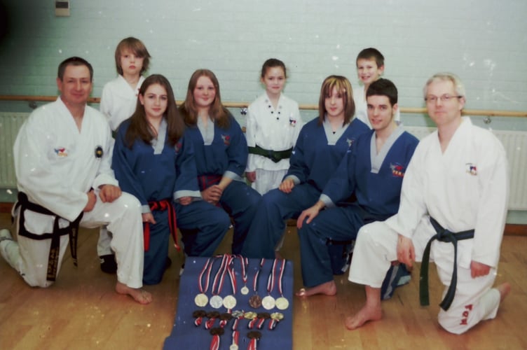 Dave Powlesland Taekwon Do students and medals won at competitions in March 2006. DSC00708