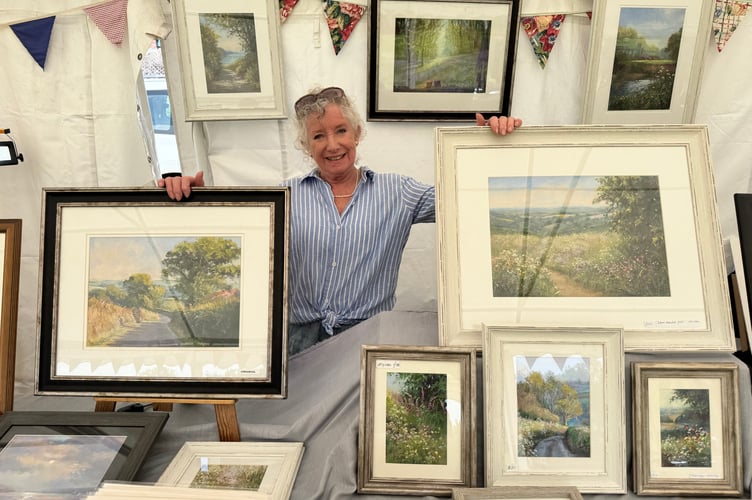 Pam Cox sold some of her art at MorFest. AQ 1599