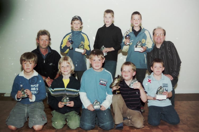 Crediton Saints FC Under 10s with coaches Nigel Garside, left, and James Cookson in May 2006. DSC01345