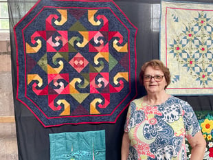 Quilt exhibition raises thousands for church, charity