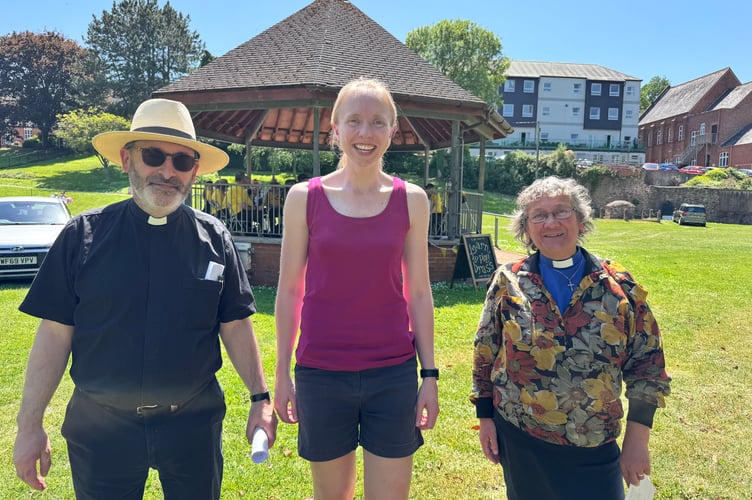 Crediton Rector, Rev Matthew Tregenza and Assistant Curate, Rev Sandra Collier, with Sarah Preece, centre. AQ 1682