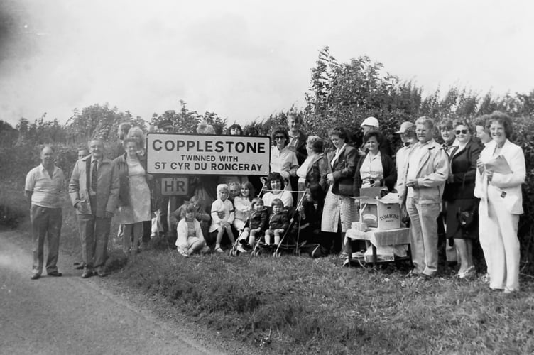 Parish councils from the local area and representatives from St Cyre de Ronceray, France, attended the unveiling of the Copplestone twinning sign in August 1985. DSC00060