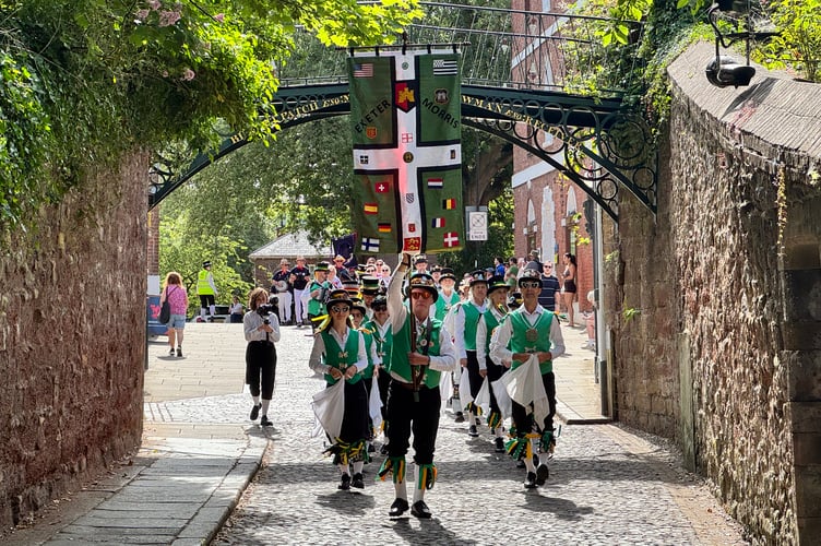 The procession was led by Exeter Morris.  AQ 2126