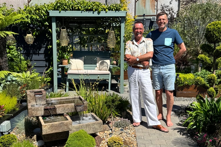 John and Richard of Ridgeway Court in part of their impressive garden. AQ 2316