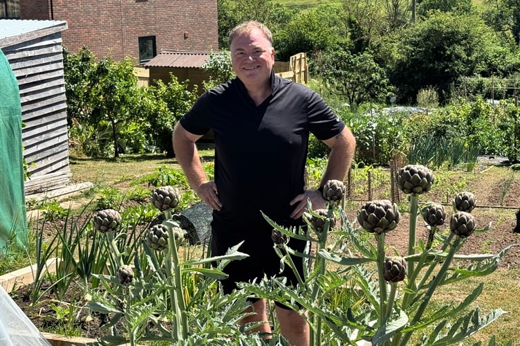 Simon March with his impressive artichokes. AQ 2313