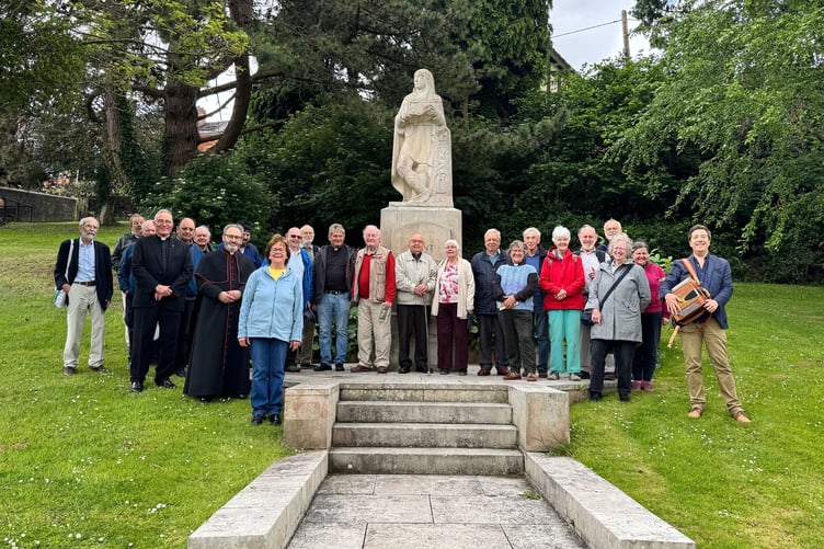 Those who gathered to celebrate St Boniface on June 5 at his statue in Crediton. AQ 2723