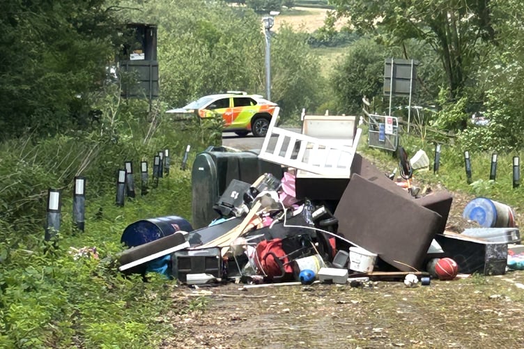 The fly-tipped rubbish blocking the M5 emergency access route at Little Copse.