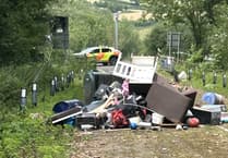 Fly tipped rubbish blocks M5 emergency access route
