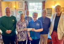 Charity supporter thanks Rotarians who raised £1,200 in swim-a-thon