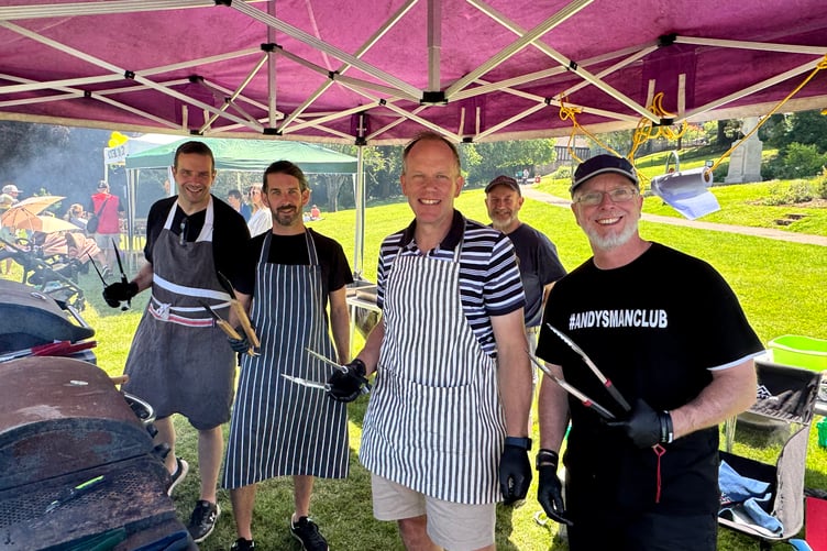 Busy boys on the barbecue at the church fund day. AQ 3046