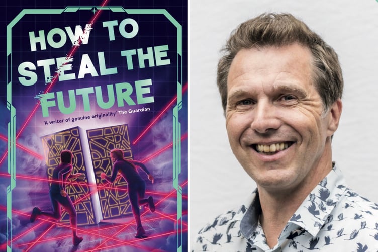 Christopher Edge, right, with his new book How To Steal The Future