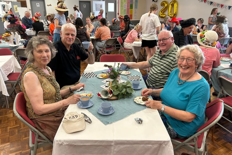 Guests at the Mad Hatter Tea Party.