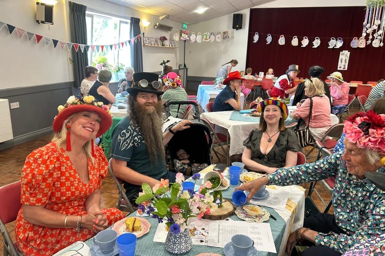 Guests at the Mad Hatter Tea Party.
