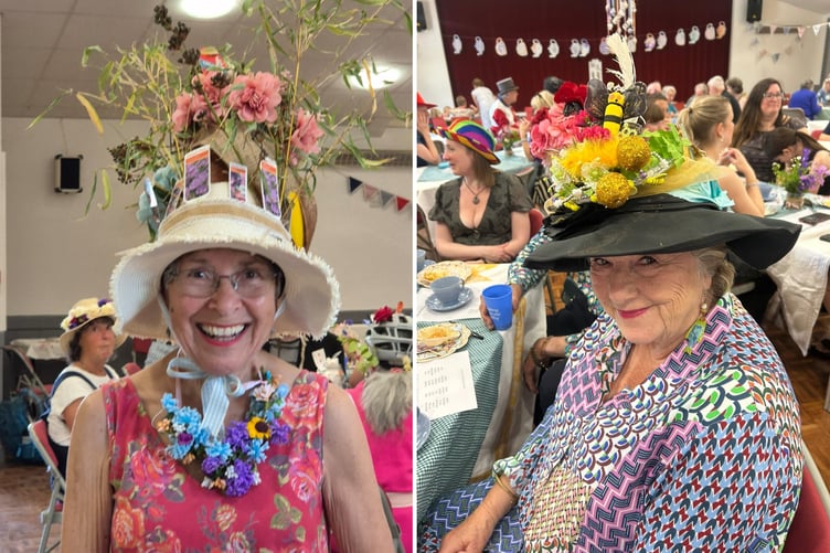 Guests at the Mad Hatters Tea Party in their hats.