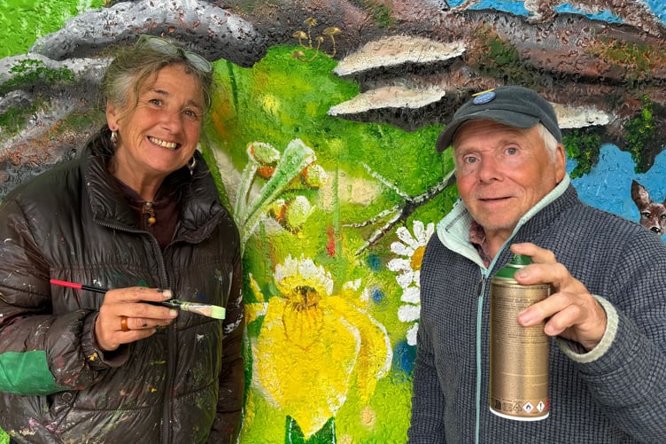 Sarah Harvey and John Hurford who are creating the giant mural in Chulmleigh. AQ 2976
