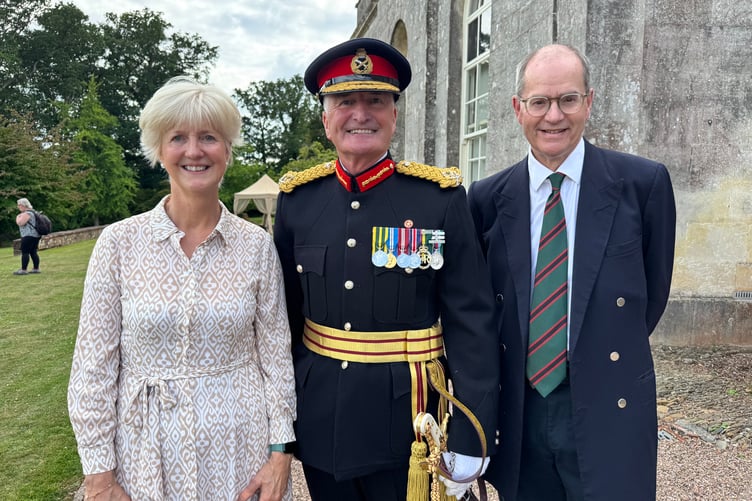 Deputy Lord Lieutenant of Devon, Major General Bill O’Leary with event hosts Susan and Henry Parker. AQ 3645