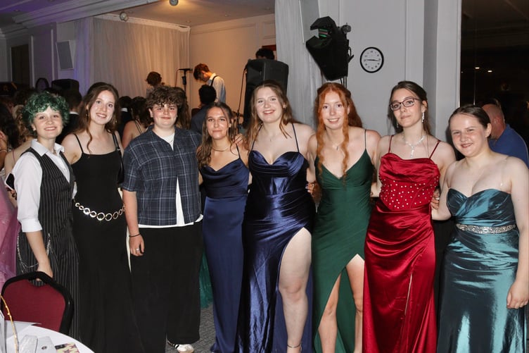 A group of friends during a lull in the dancing