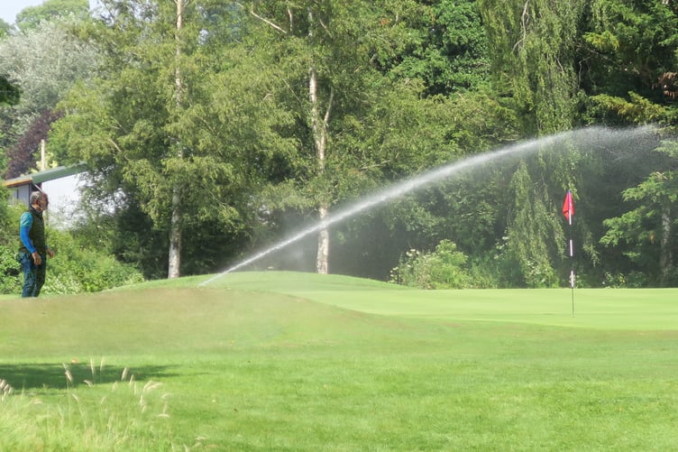Irrigating the 3rd green, nearly a mile away from the water source.