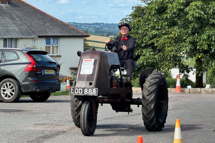 An unusual tractor arriving for Coldridge Fete and Vintage Rally. AQ 3957