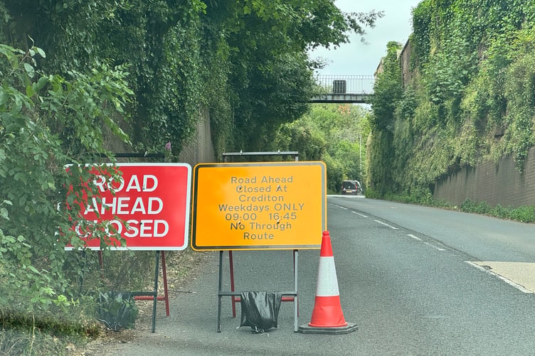 Road warning signs in Newton St Cyres. AQ 4439
