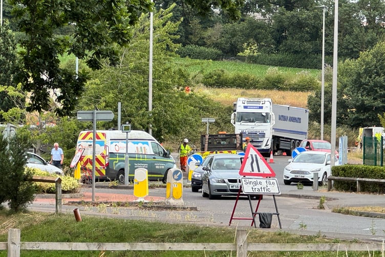 Traffic using the convoy system and three-way lights to access Tesco, Redlands, Mole Avon, McDonald’s, the A377 towards Exeter and Joseph Locke Way. AQ 4465
