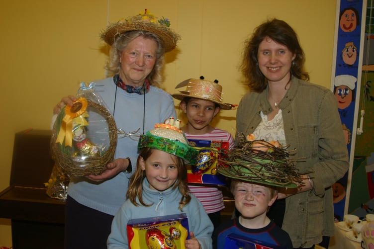 Easter bonnet competition winners at Bow School with the new headteacher Hazel Fox, right in April 2004. 181-8110_IMG