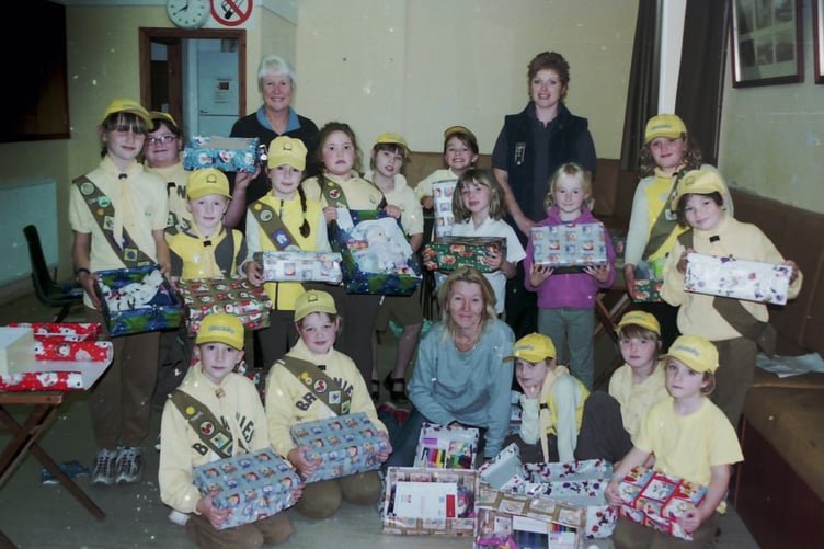 North Tawton Brownies packed shoeboxes for less fortunate children at Christmas in September 2005. DSC00002