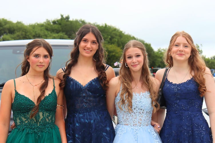 Girls in formal evening dresses