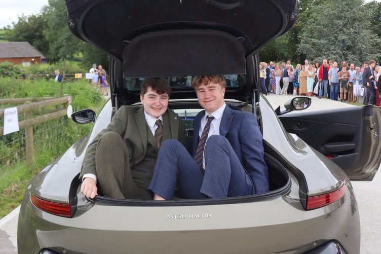 In the back of an Aston Martin