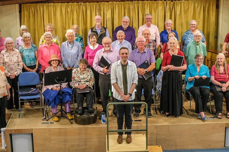 The Mid Devon Good Afternoon Choir with their MD Jon Rawles.