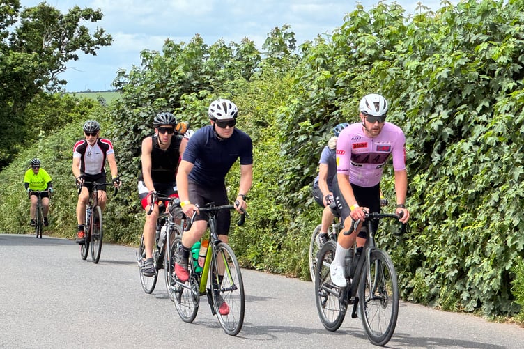 Cyclists on the Nello ride on Higher Road, Crediton. AQ 4397