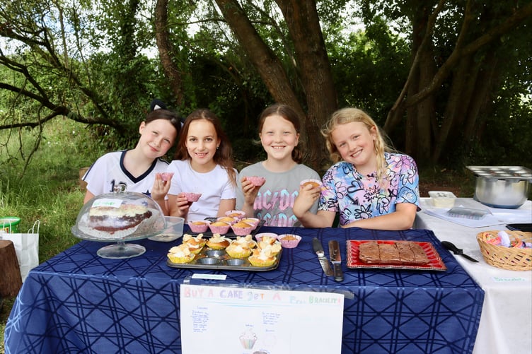 These four friends sold cakes and gave out free bracelets