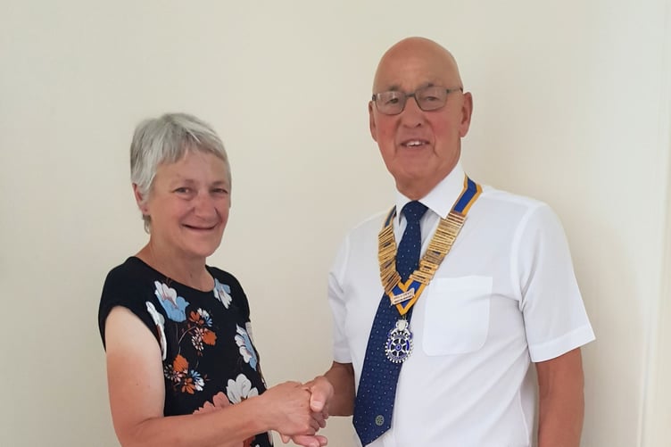 Outgoing president Jane Brimacombe with new president Paul Fallon