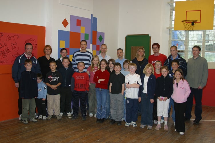Lapford Youth Club members and helpers with a team from the Amber Foundation who repainted the youth club in April 2005. 251-5127_IMG