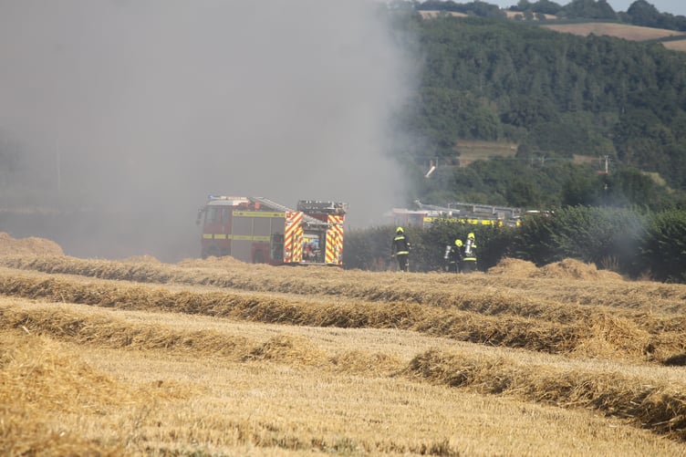 Firefighters in breathing apparatus at Sweetham. AQ 1587