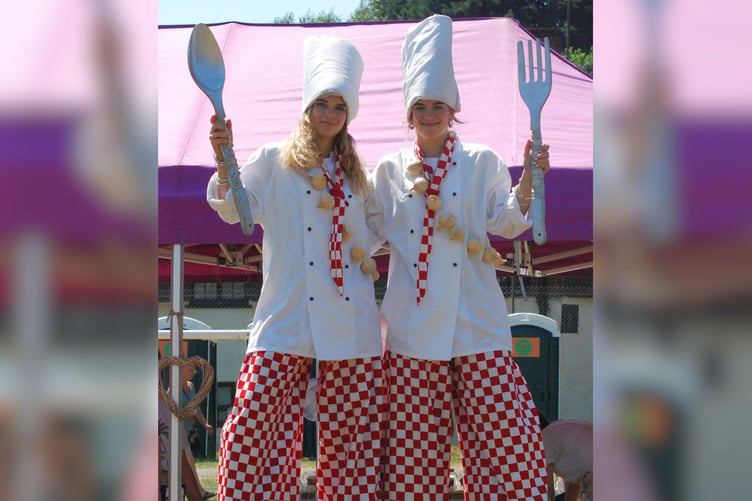 Higher Beings Circus stiltwalkers entertained people at the festival