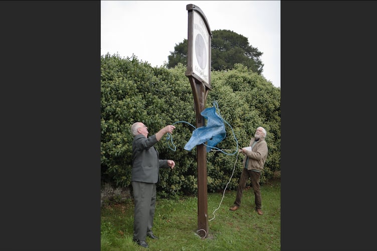 Norman Vicary and Nick Burgess unveiling the Zeal Village Sign after renovations in 2006.