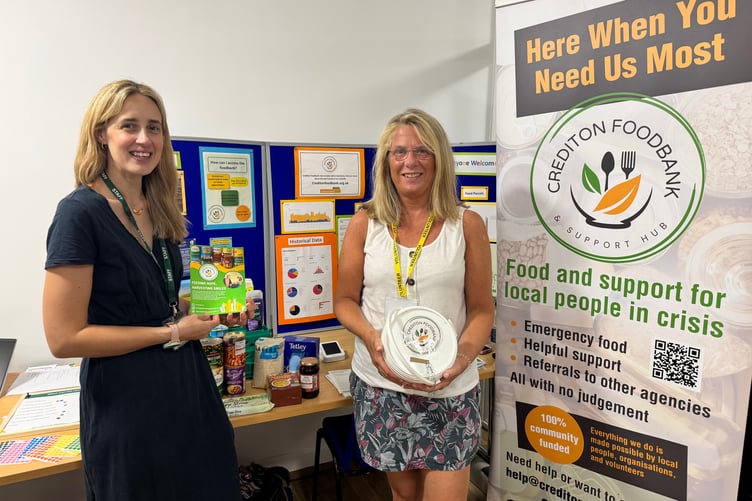 Helen Moores, Co-Ordinator, Crediton Foodbank, left, Keri Storey, Chairperson, at the recent Community Day at Active Mid Devon (Lords Meadow). AQ 5295