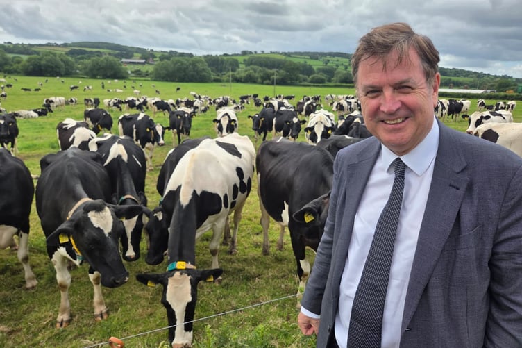 Mel Stride, pictured during his visit to Park Farm near Bradninch, is backing Devon’s dairy farmers and the future of British food.