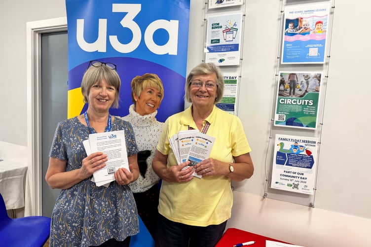 Theresa Garnham Lowe and Wendy Hands ran the stall about Crediton U3A. AQ 5284