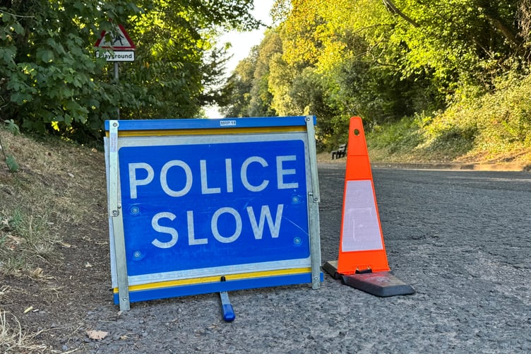 The Police Slow sign on Jockey Hill. AQ 6197