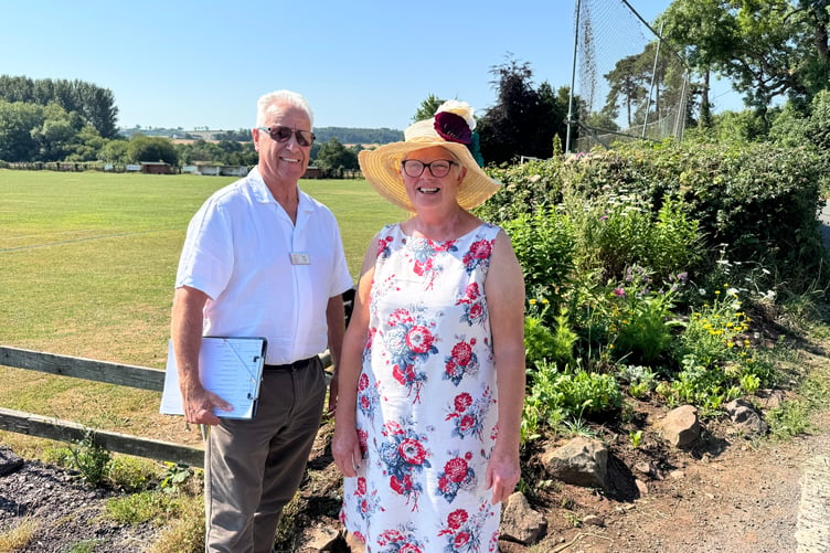 Mr Ollier and Cathy at Newton St Cyres Recreation Ground. AQ 4927