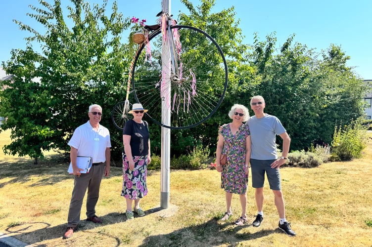 Old bicycles highlighted the Boniface Trail and sustainable travel for the Britain in Bloom judging, here at Kingfisher Close.  AQ 4943

