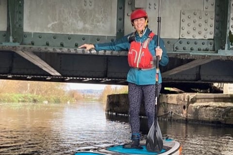 A paddleboarder at the A379 bridges in Exeter