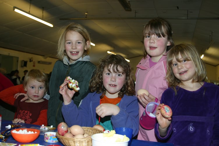 Decorating eggs and biscuits were activities that children enjoyed at the Friends of Sandford School's jumble sale in March 2004. 179-7904_IMG