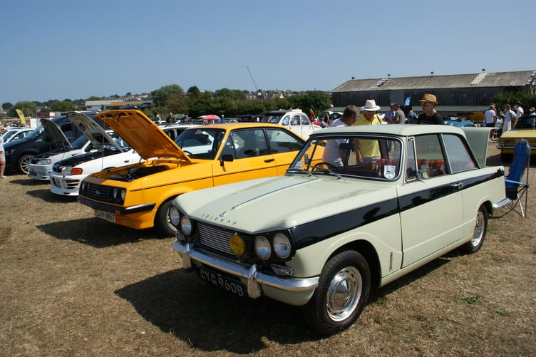 Six appeal: This locally owned 1964 Triumph Vitesse 6 in its rare Cactus Green and Black paintwork looks stunning!
